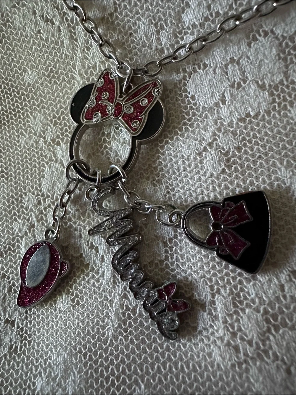 Minnie mouse necklace by Disney silver toned falls 13 inches